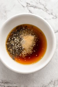 Combine the marinade ingredients in a bowl