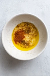 Combine the marinade ingredients in a mixing bowl