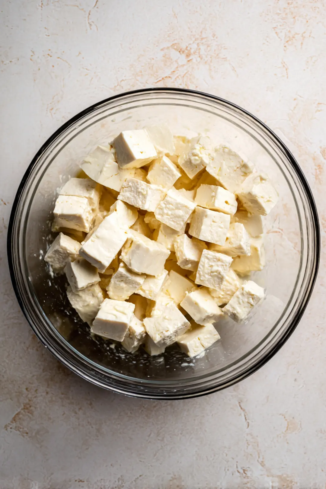 Cut halloumi into cubes and coat with marinade for 10 minutes