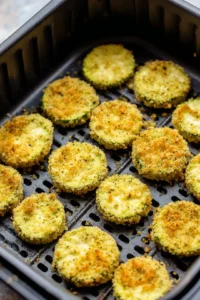 Dip each pickle slice into buttermilk and dredge in cornmeal mixture