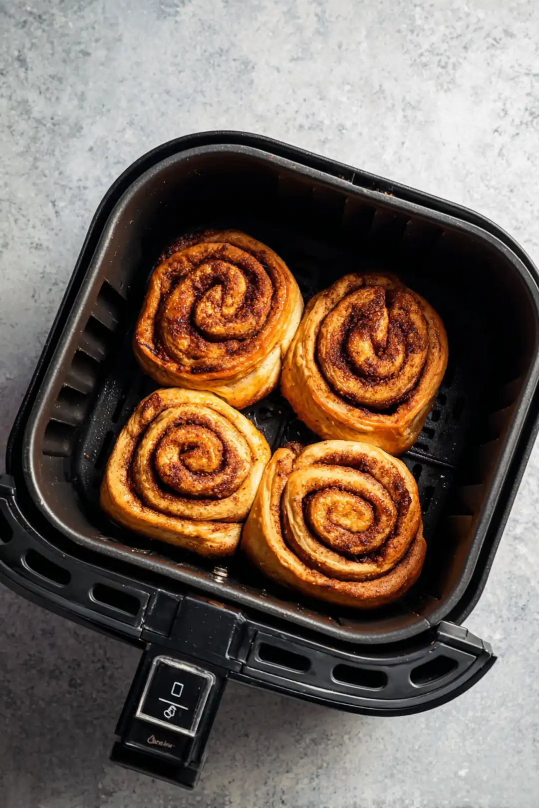 Drizzle icing over the rolls and serve warm