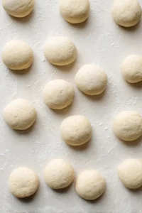 Flatten the dough into rounds