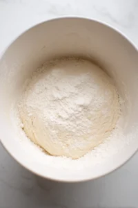 Knead the dough until smooth and elastic