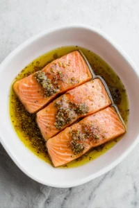 Let salmon fillets sit in marinade for 10 minutes