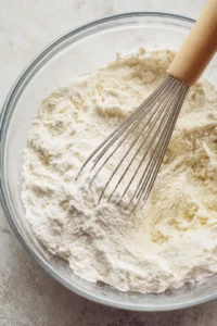 Mix flour, baking soda, and salt in a bowl