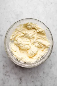 Mix pancake mix and lukewarm water until smooth