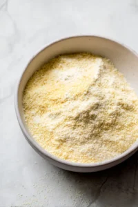 Mix the cornmeal, flour, garlic powder, onion powder, salt, and pepper together in a medium bowl