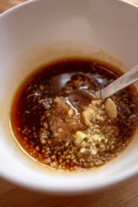 Mix the marinade ingredients in a bowl