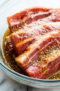 Place beef belly slices in marinade