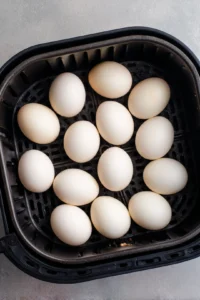 Place eggs in the air fryer basket in a single layer