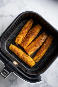 Place seasoned corn ribs in air fryer