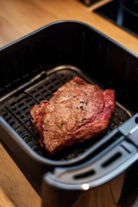 Place steak in air fryer