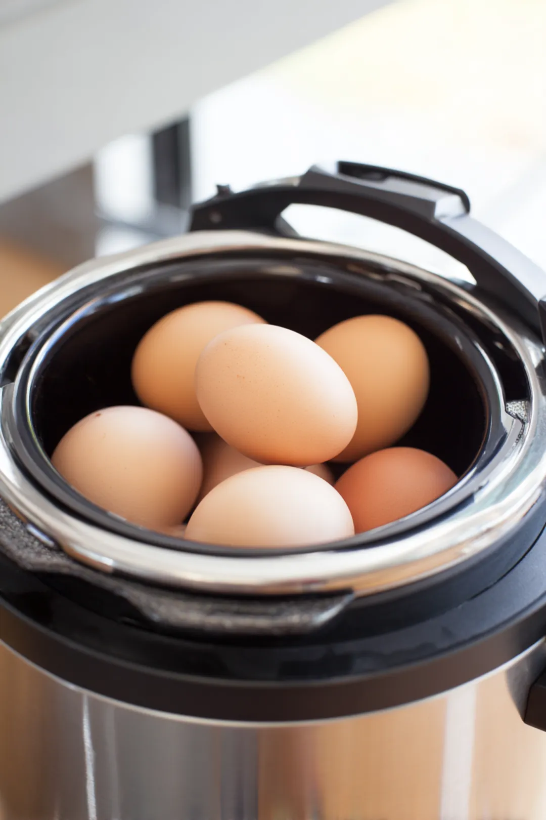 Place the eggs in the pressure cooker and lock the lid securely