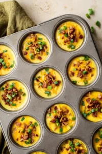 Pour the mixture into a greased muffin tin