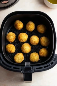 Preheat air fryer and prepare croquettes