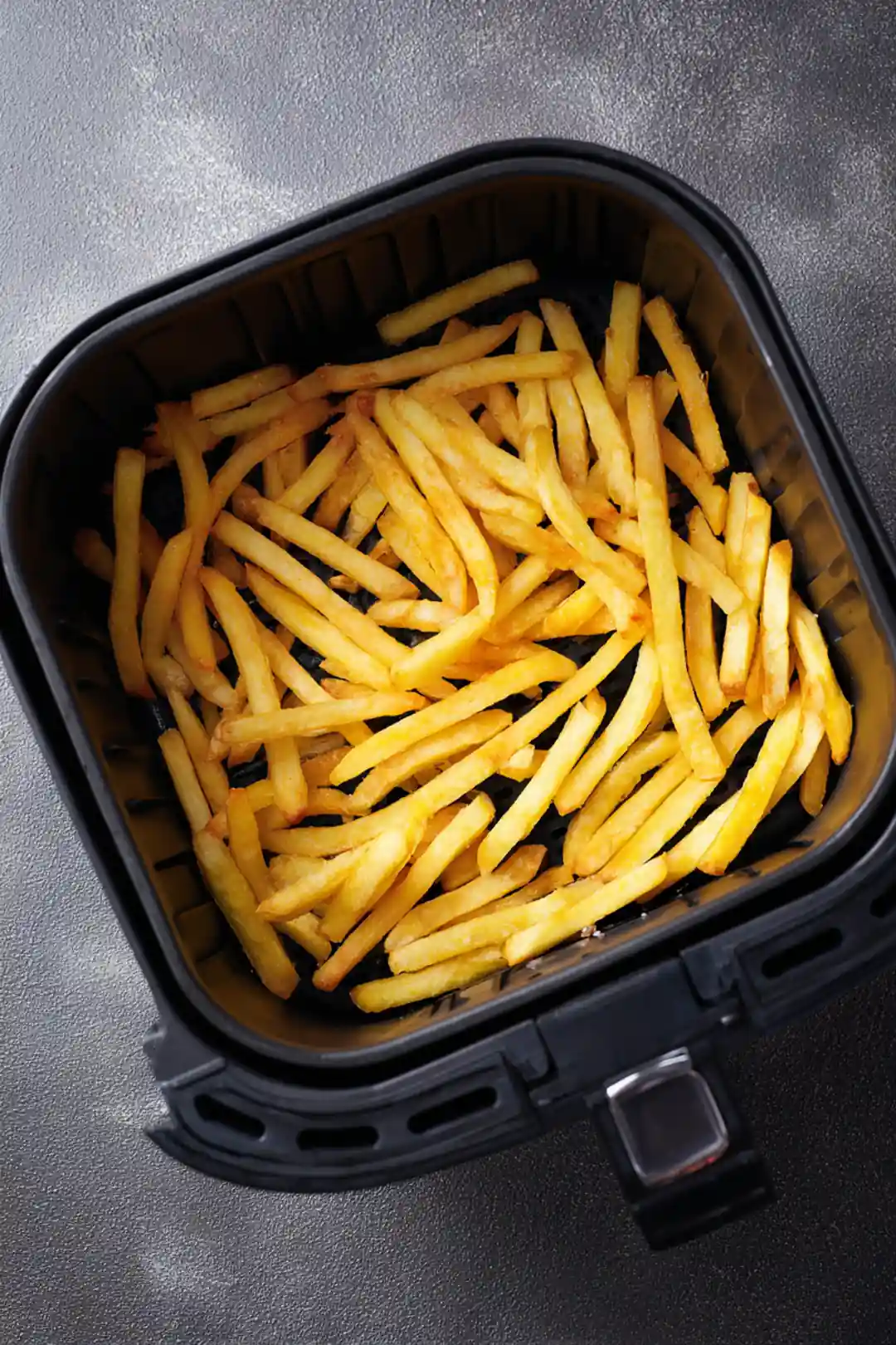 Preheat the air fryer and cook fries for 15 minutes