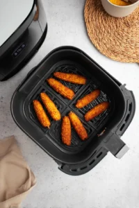 Preheat the air fryer to 400°F and cook corn ribs until crispy and golden brown