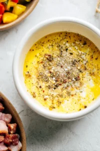 Season the egg mixture with salt and pepper