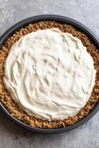 Spread yogurt mixture evenly over the granola crust and air fry at 320°F for 20 minutes