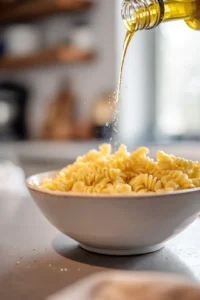 Toss leftover pasta with olive oil, salt, and pepper