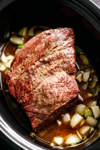 Transfer the browned roast to a slow cooker