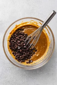 Whisk together melted butter, sugar, egg, and vanilla