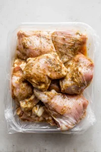 Add chicken thighs to marinade and refrigerate