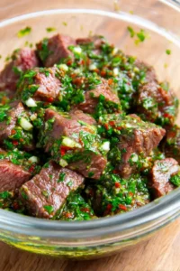 Add steak pieces to marinade