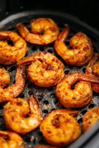Air fry the shrimp for 10-12 minutes, flipping halfway through, until golden brown and crispy