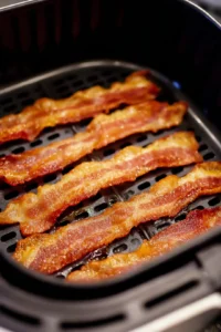 Arrange bacon strips in a single layer in air fryer