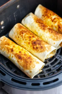 Arrange burritos in air fryer