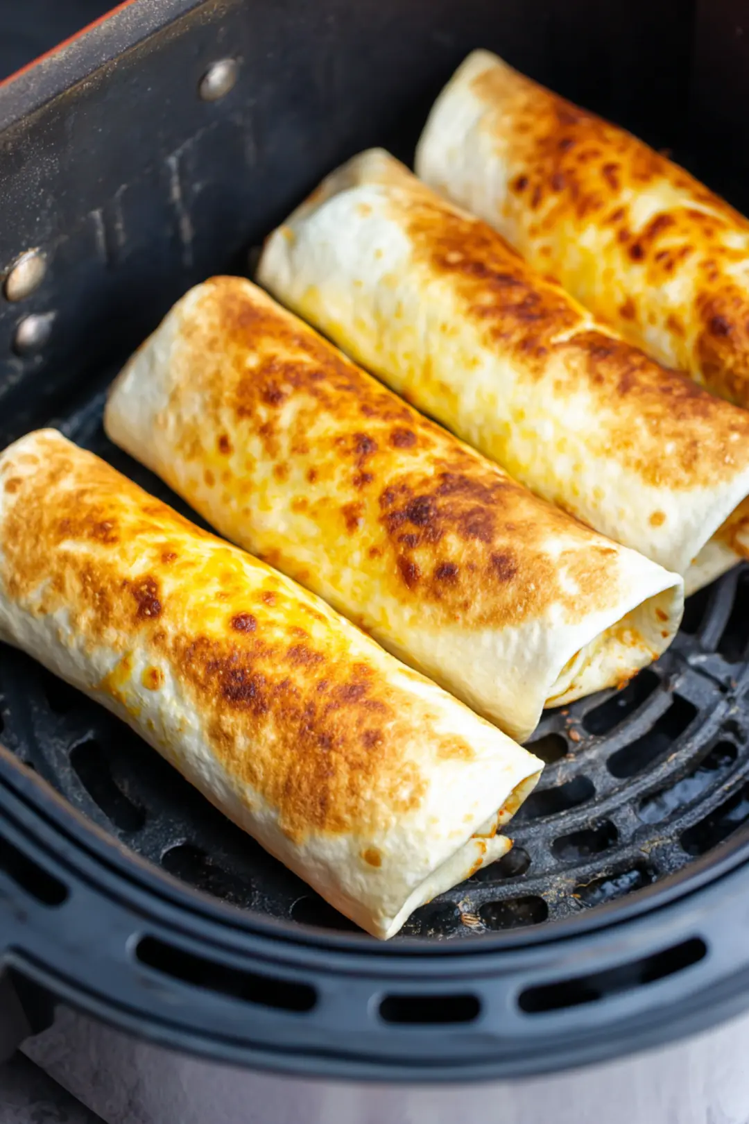 Arrange burritos in air fryer