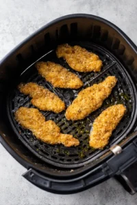 Arrange chicken fries in air fryer