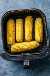 Arrange frozen corn on the cob in a single layer in the air fryer basket