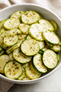 Arrange zucchini slices with seasoning in air fryer