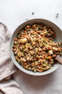 Combine leftover stuffing, egg, and optional ingredients in a bowl