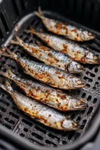 Combine sardines with spices