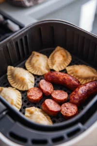 Cook kielbasa and pierogies in the air fryer