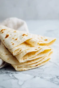 Cut the flour tortillas into wedges
