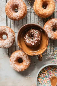 Dip the cooked donuts into the coating mixture and enjoy warm