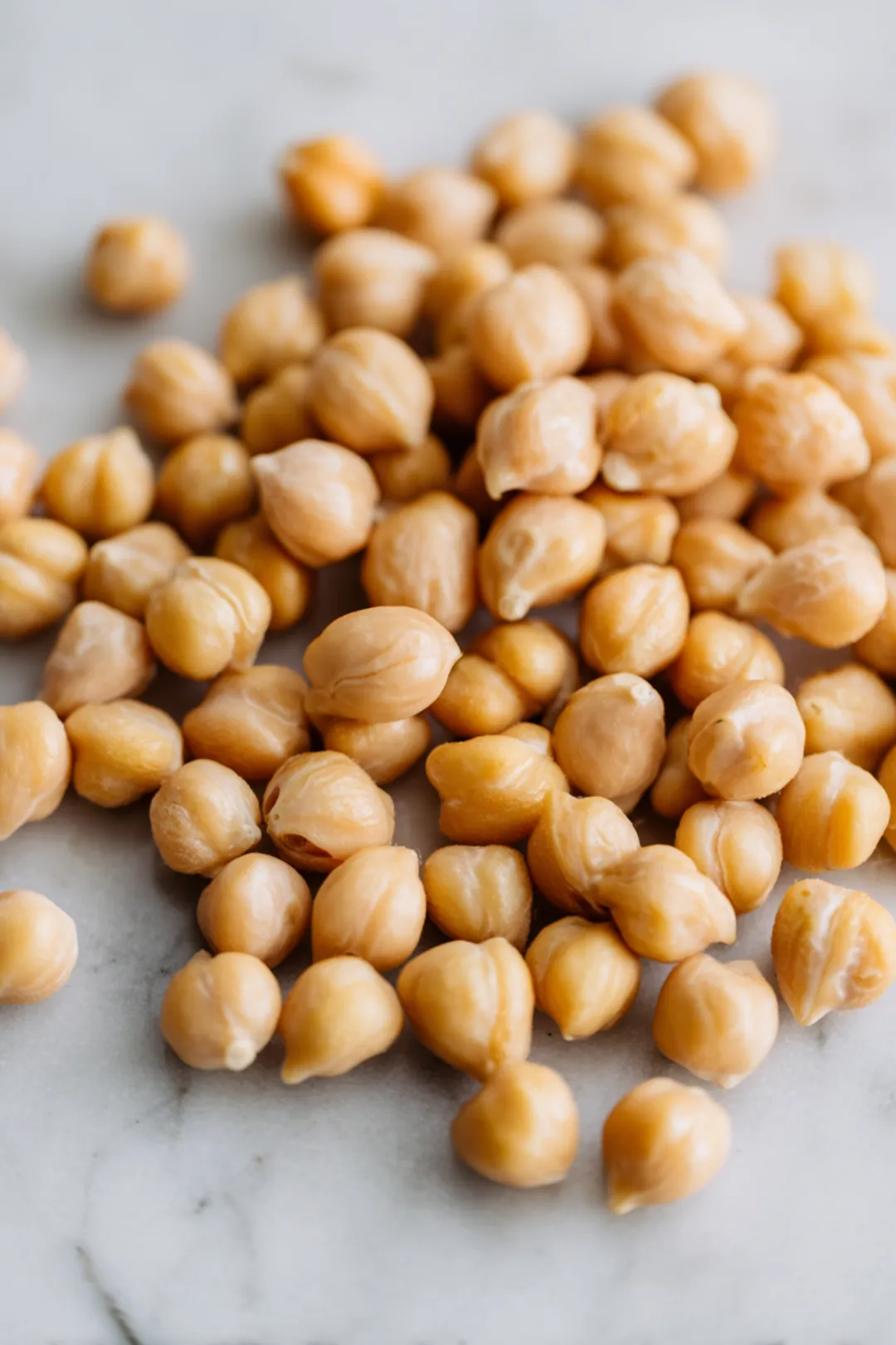 Drain and rinse the canned chickpeas and pat them dry with a paper towel
