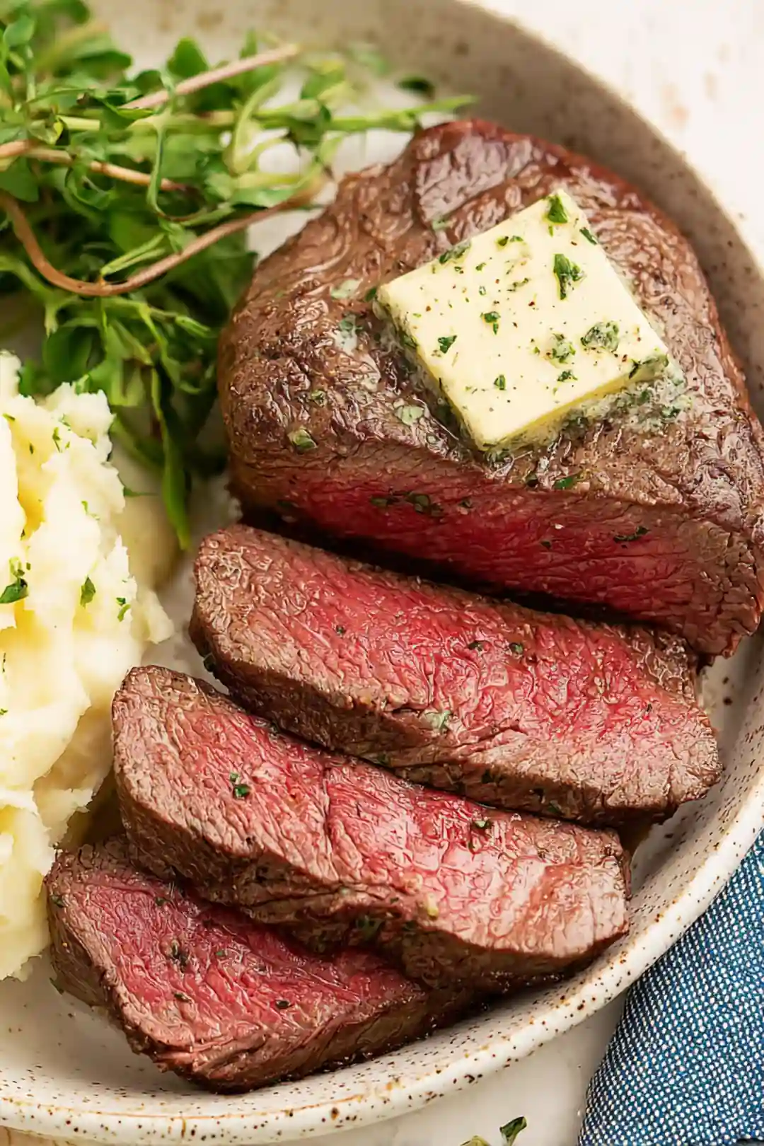 Making air fryer compound butter steaks