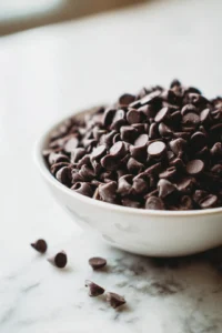 Melt dark chocolate chips in a microwave-safe bowl
