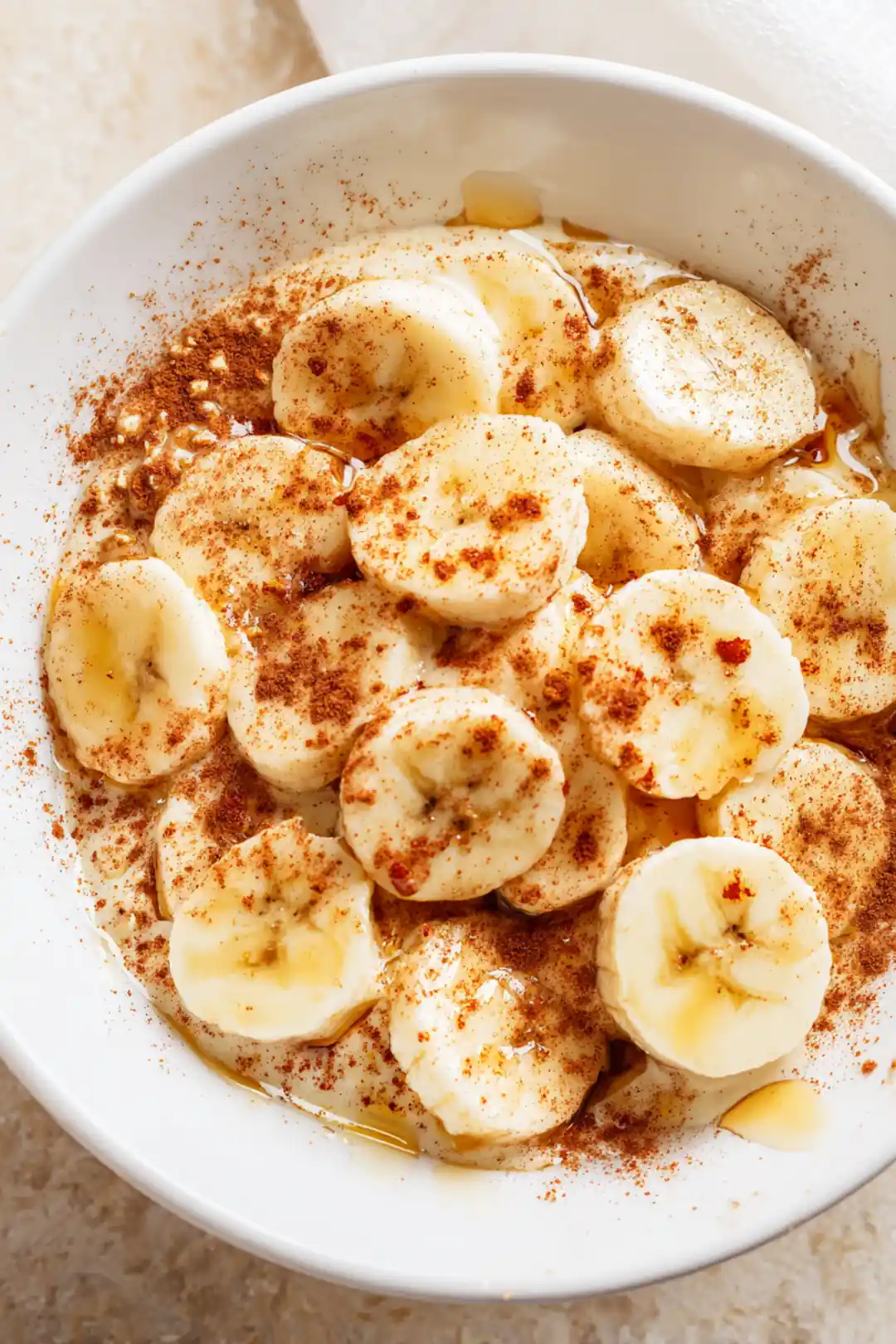 Mix sliced bananas with honey and cinnamon