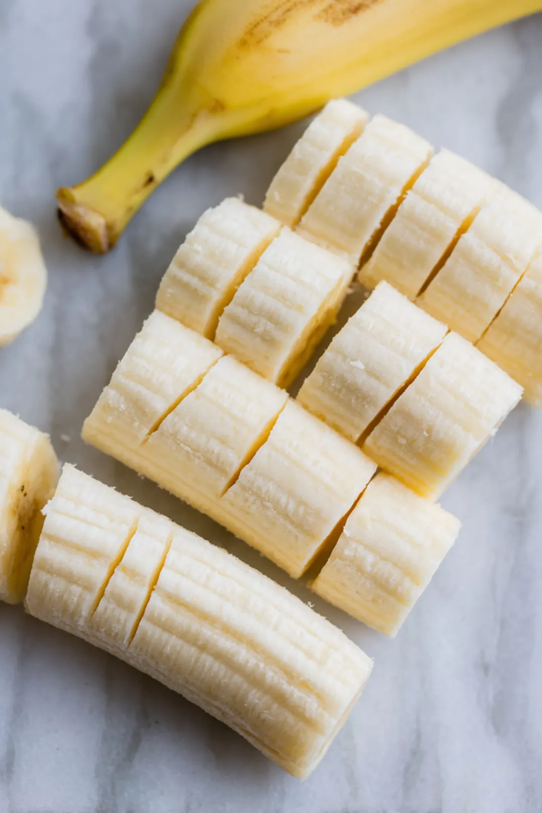 Peel the bananas and slice them