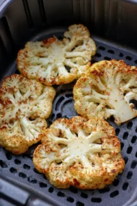 Place cauliflower steaks in air fryer