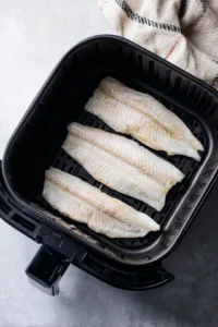 Place fillets skin side down in air fryer