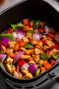 Place mixture in air fryer and cook for 15-20 minutes, shaking halfway through.