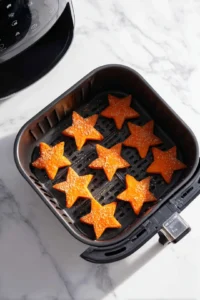 Place sweet potato stars in air fryer
