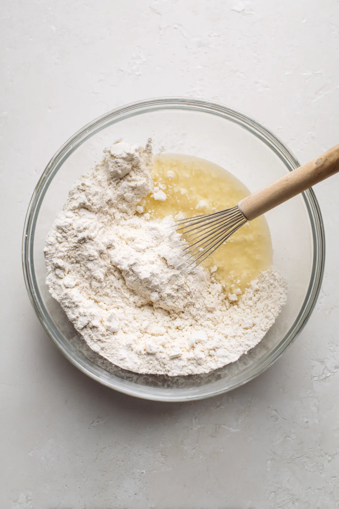 Pour the batter into greased mini loaf pans and air fry